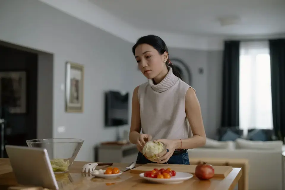 Dog owner preparing a meal