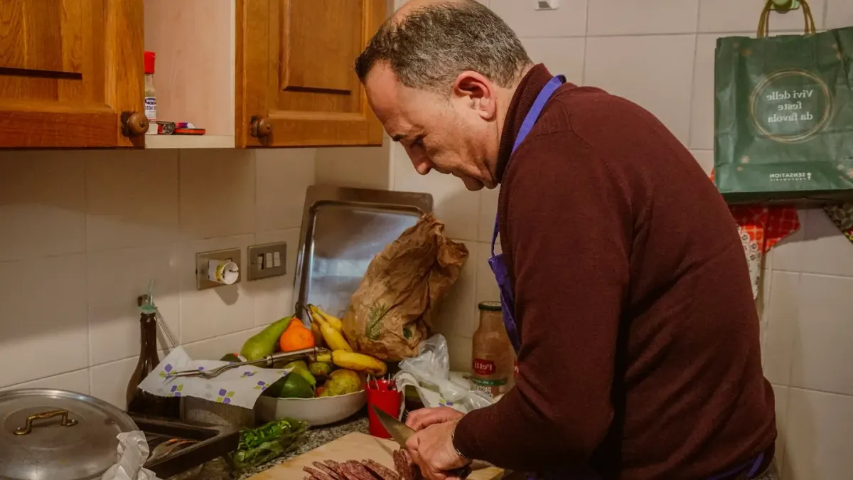 Dog owner preparing a meal
