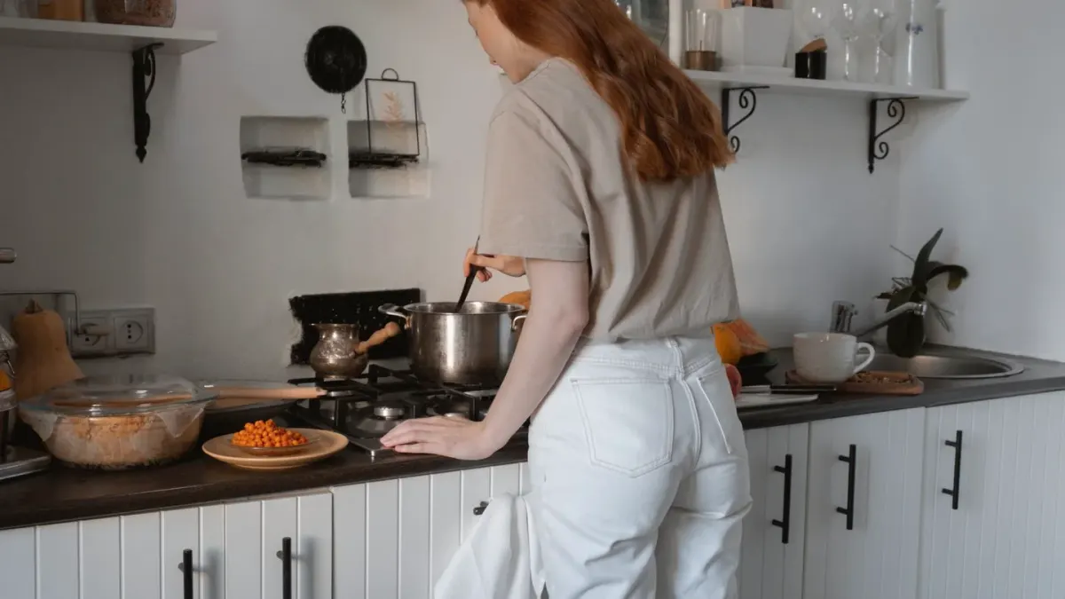Dog owner preparing a meal