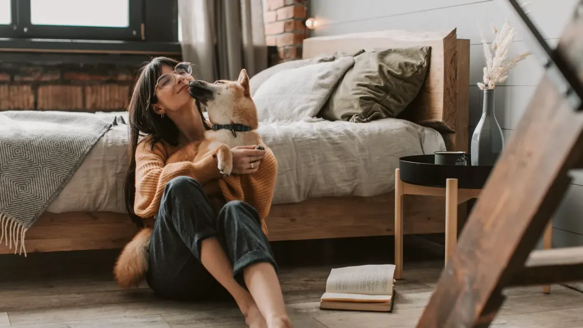 Dog with an owner at home